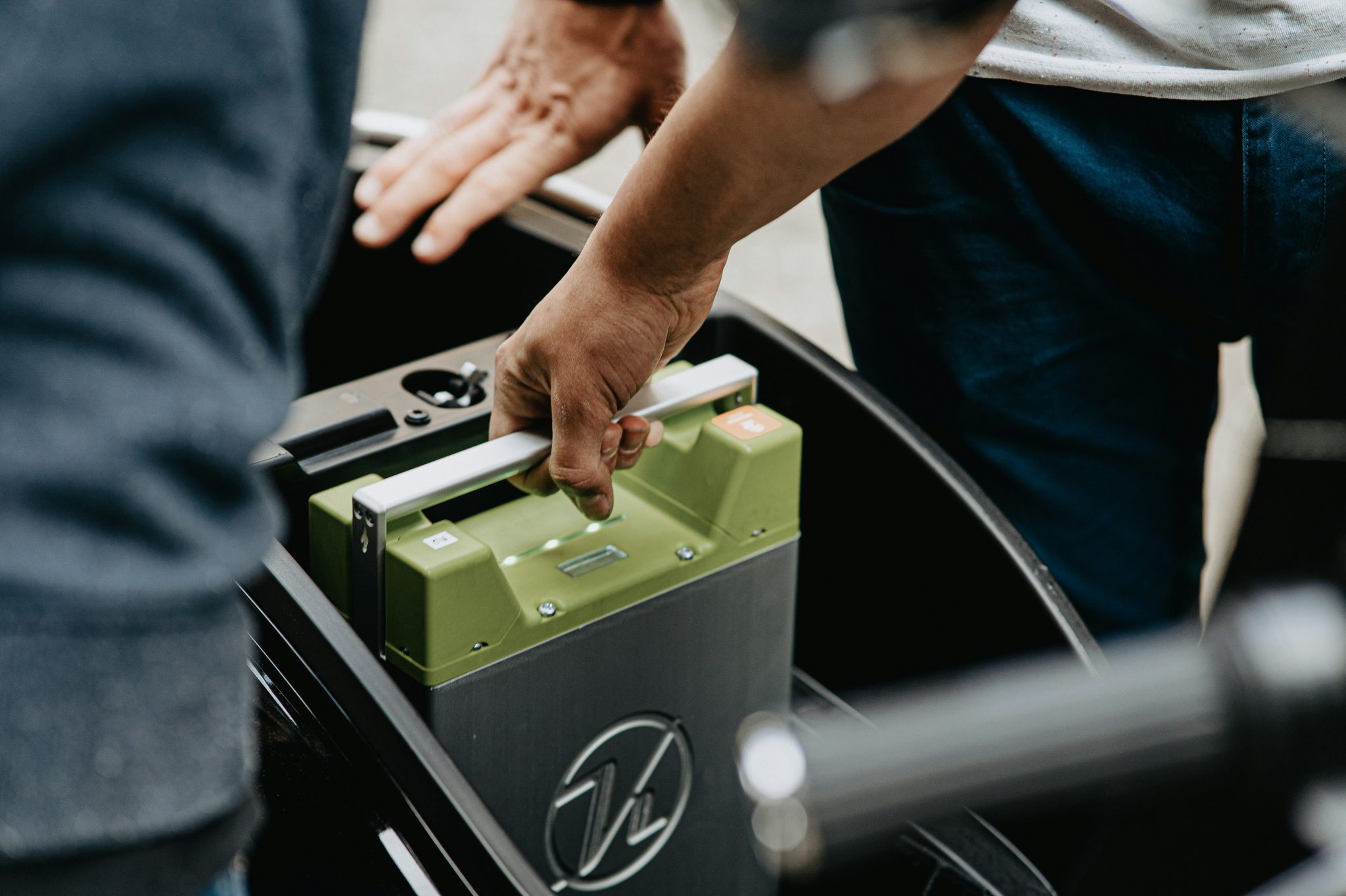 A person storing batteries for home battery backup power in Houston.